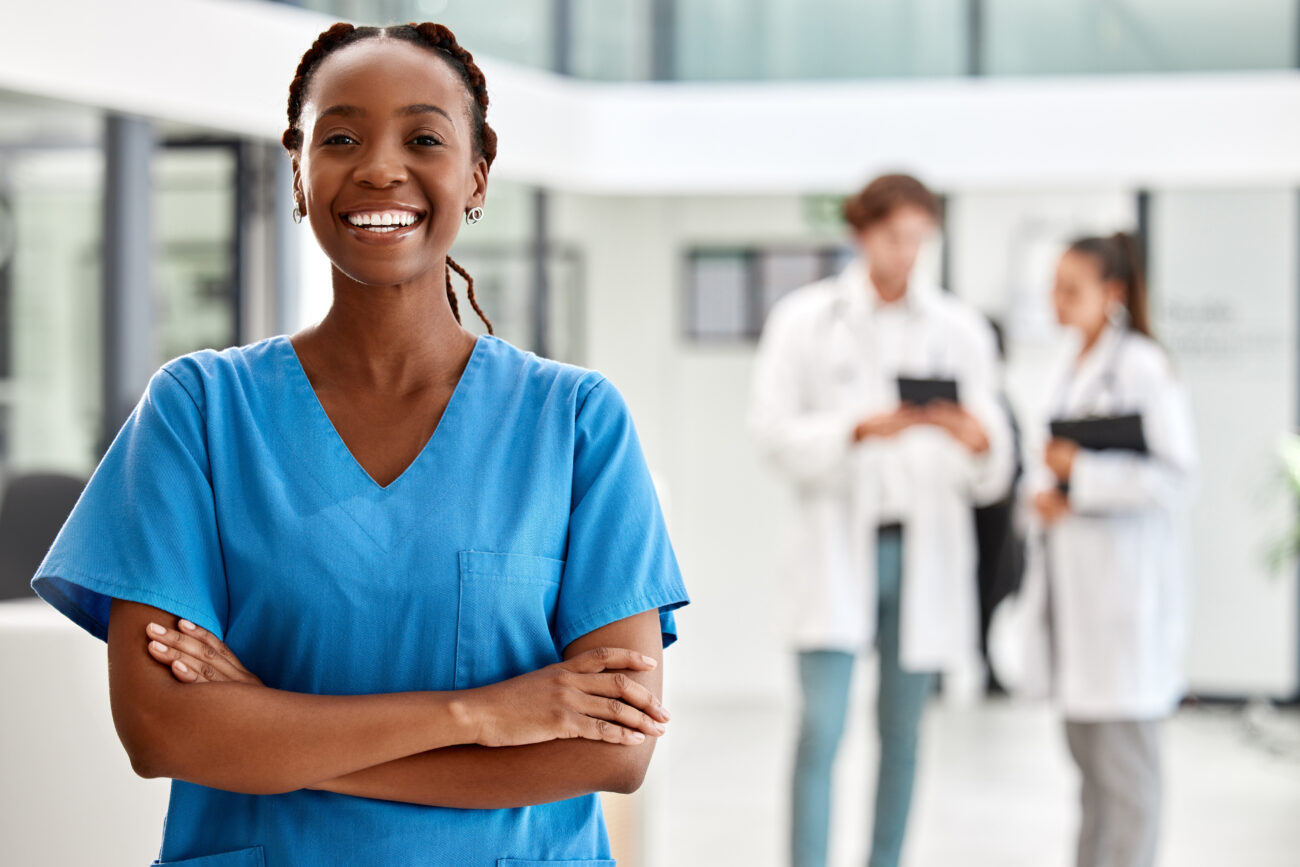 nurse, healthcare and medicine with a woman working in healthcare for health, wellness or insurance in a hospital portrait of a female medical student or professional standing arms crossed inside